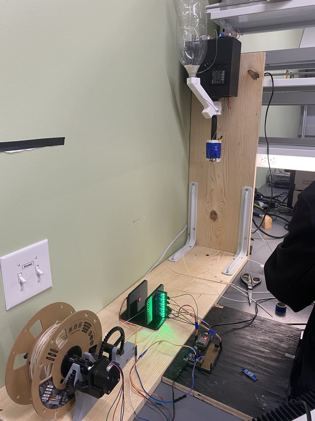 The complete FilaStruder system — vertical extruder, winder and sensing integrated