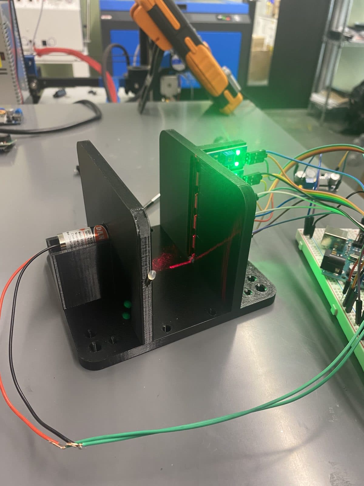 The finished slack sensor — LDR array with line laser